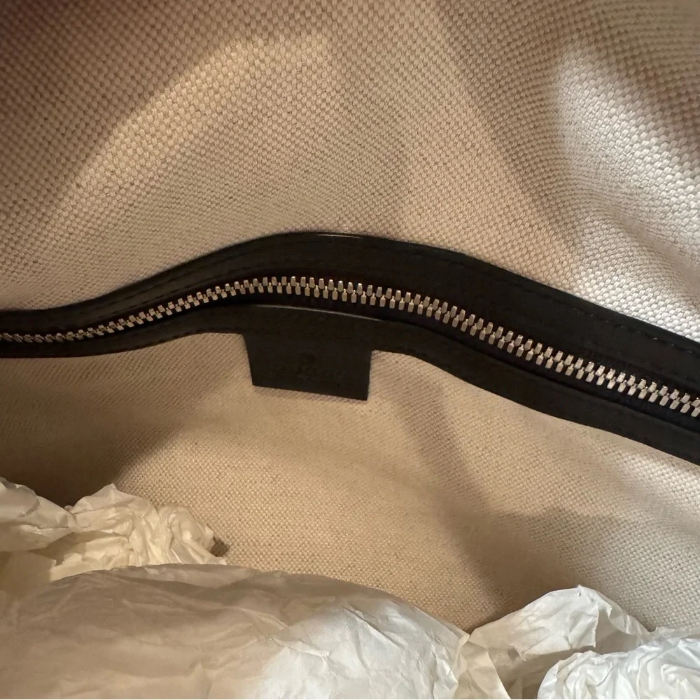 New! Gucci GG embossed black leather duffel bag